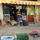 A tire-mounting shop with some turtles out front.